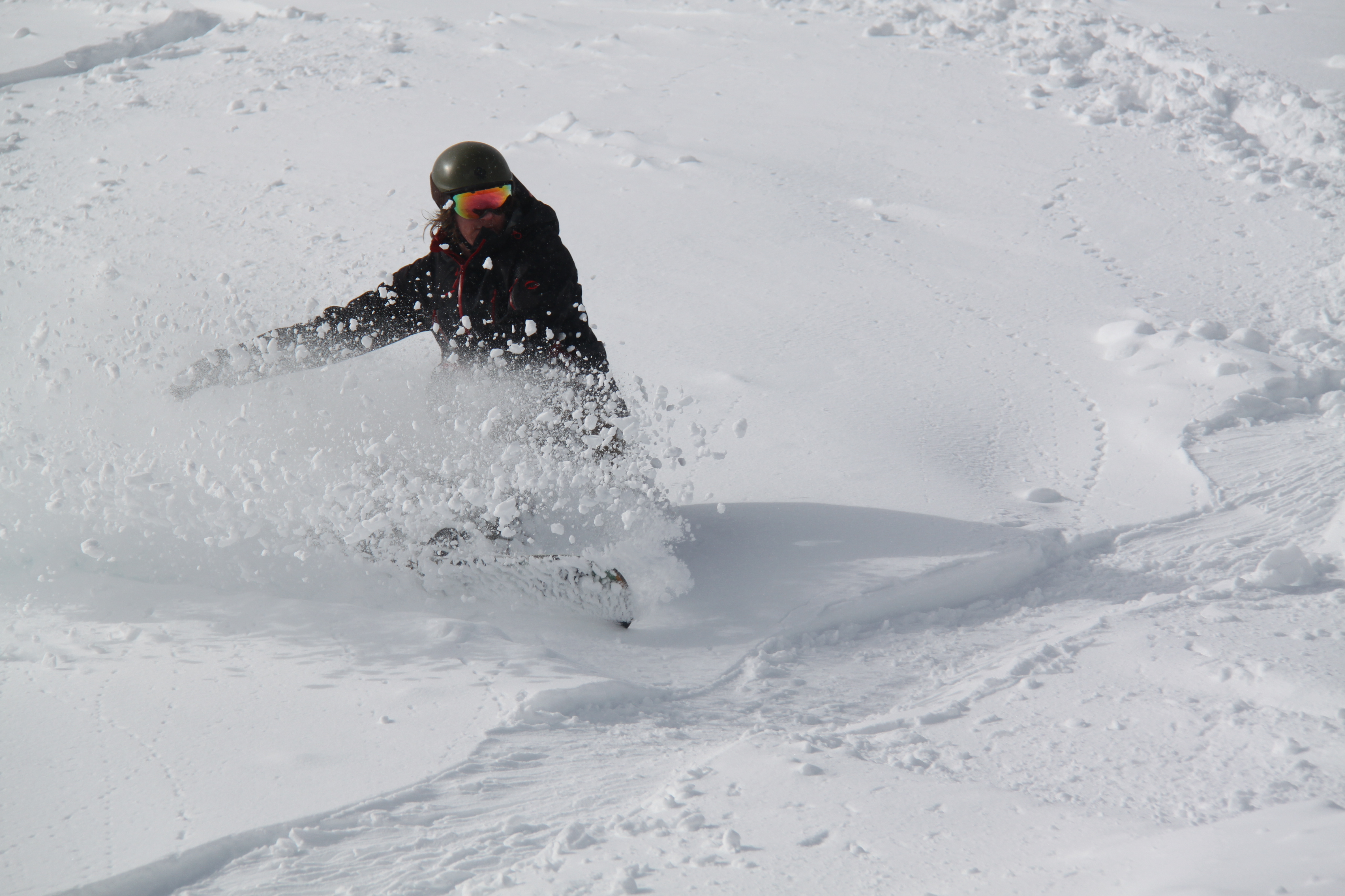 Snowboarder enjoying the powder at Sunshine Village, Banff, Alberta.